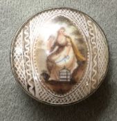 A George III white metal pill box
The enamelled bowed glass cover enclosing a portrait miniature