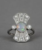 An Art Deco opal and diamond set 18 ct white gold and platinum ring, stamped 18 & PT
 CONDITION