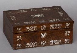 A 19th century mother-of-pearl inlaid rosewood sewing box
Of hinged rectangular form with