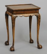 An 18th century style walnut side table
43.5 cm wide. CONDITION REPORTS: Fading, some splits,