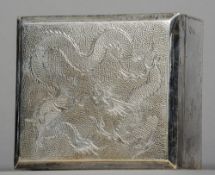 A Chinese silver cigarette box
Of square section form, the hinged lid engraved with a dragon.  10.