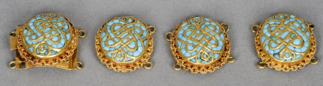 Four early turquoise mounted unmarked yellow metal bracelet roundels
One with clasp back. Each 2