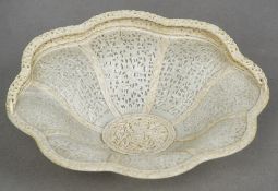 A 19th century Cantonese pierced ivory basket
With twin loop handles, the main body decorated with