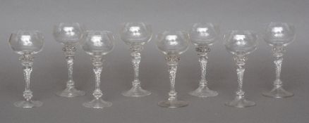 A set of eight late 19th century vine etched clear hock glasses
The typical bowl above the twisted