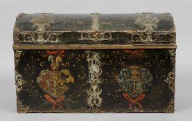 A 17th century North European painted pine marriage trunk
The hinged domed lid with pierced and