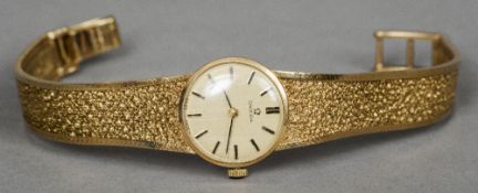 A 9 ct gold lady's Omega wristwatch
The dial 2 cm diameter. CONDITION REPORTS: Overall good, some