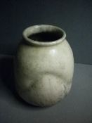 A Ruskin pottery vase
The moulded body with crystalline glaze, impressed mark Ruskin, England and