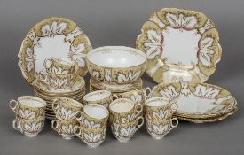A 19th century porcelain part tea and coffee service
Each piece with a cream and white ground with