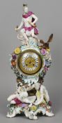 A Meissen porcelain figural mantel clock
Surmounted with a figure of Zeus.  70 cm high.