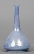 A Ruskin pottery vase
With slender neck and lilac lustre glaze, impressed mark Ruskin, England and