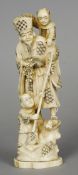 A late 19th century Japanese ivory okimono
Formed as a sage with two smaller figures.  25 cm high.