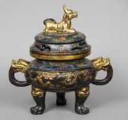 A 19th century Chinese cloisonne decorated bronze censer and cover
The pierced removable lid with