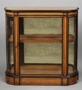 A Victorian amboyna and ebonised glazed pier cabinet
95 cm wide. CONDITION REPORTS: Overall good,