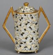 A late 19th century Japanese Satsuma vase and cover
With twin angular handles, the cylindrical