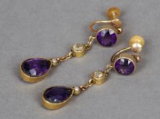 A pair of 9 ct gold, diamond, amethyst and seed pearl ear pendants
Each 3.5 cm long. CONDITION