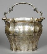 A Continental silver, possibly Italian, pail
Of shaped bombe form with scrolling and foliate