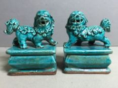 A pair of Chinese pottery seals
Each surmounted with a temple dog with allover turquoise glaze.