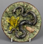 A late 19th century Palissy type maiolica wall plate
Decorated with a snake, a toad and a crayfish.