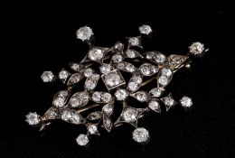 An early 20th century unmarked gold diamond openwork brooch
Estimated total diamond weight