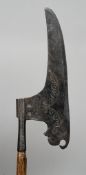 A 16th/17th century side axe
Of typical form with an engraved and stamped blade.  132 cm long.