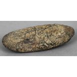 An early, possibly Stone Age, axe head
Of typical form.  10 cm wide. CONDITION REPORTS: Some