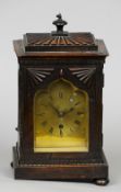 A 19th century mahogany bracket clock
The brass dial with Roman numerals and single winding