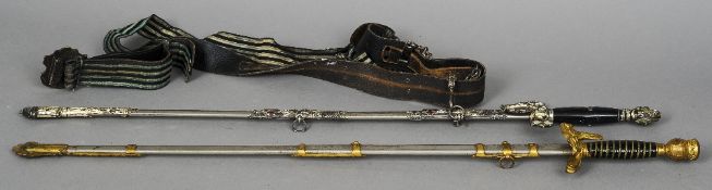 Two American swords, probably of Masonic interest
Each in an ornately decorated scabbard.  The