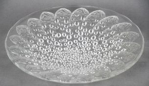 A Lalique clear glass poisson dish
Typically modelled with fish.  35.5 cm diameter.  CONDITION