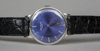 An 18 ct white gold cased Patek Philip gentleman's wristwatch
The circular blue ground dial with