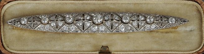 An Art Deco unmarked gold and platinum diamond brooch
Of navette form set with approximately 2.25