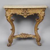 A late 19th century marble topped gilt console table
The rounded rectangular marble top above