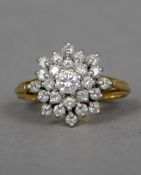 A 9 ct gold cluster ring
 CONDITION REPORTS: Overall good, some general wear.