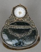 A 19th century Continental unmarked silver mounted moss agate clip watch
The front with motto