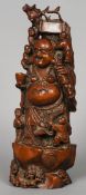 A Chinese carved hardwood figure of The Laughing Buddha
Typically worked with child attendants.