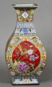 A Chinese porcelain square section baluster vase Decorated with bird decorated vignettes on a floral