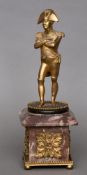 A 19th century gilt bronze figure of Napoleon
Modelled standing, arms folded, mounted on a rouge