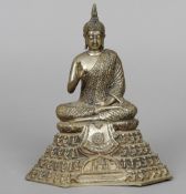 A silvered bronze model of Buddha
Typically modelled, seated in the lotus position.  27 cm high.