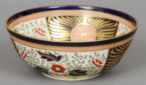 A Victorian Masons patent ironstone bowl
Decorated in the Imari palette.  26 cm diameter.