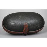 A 17th/18th century leather box
Of twin domed form, with a painted red band and red painted iron