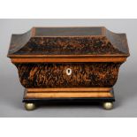 A 19th century satinwood faux wood grained box
The domed hinged rectangular top enclosing a