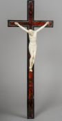A 19th century ivory, tortoiseshell and ebony crucifix Of typical form, with ivory Corpus Christi.