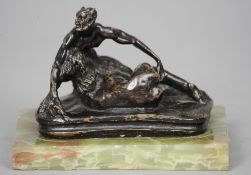 A patinated erotic bronze group
Formed as a satyr and a naked woman in a compromising position,