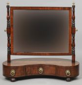 A 19th century mahogany kidney shaped dressing table mirror
61 cm wide. CONDITION REPORTS: Overall