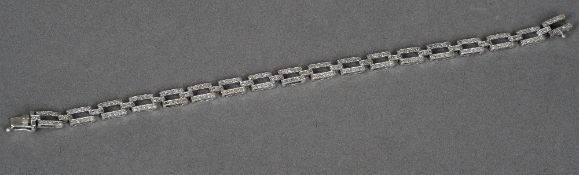 An Art Deco style 18 ct white gold diamond set bracelet
Set with approximately 2.25 carats of