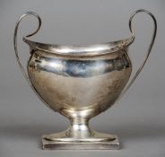 A George V silver navette shaped twin handled pedestal bowl, hallmarked Sheffield 1918, maker's mark