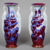 A pair of Chinese Jun ware vases
Each with twin peacock form handles, the underside with impressed