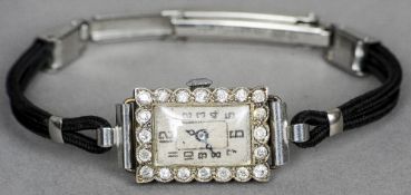 An 18 ct white gold, diamond set lady's cocktail watch
1.5 cm wide. CONDITION REPORTS: Overall good,