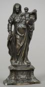 A Grand Tour patinated bronze figural group
Formed as a mother and child, standing on an acanthus