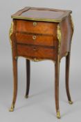 An 19th century ormolu mounted mahogany and kingwood vitrine
The hinged glazed top above a single