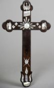 A Chinese mother-of-pearl inlaid hardwood cross
Decorated with angels and other motifs.  28.5 cm